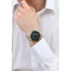 A man wearing a white dress shirt and a watch. Podgląd zdjęcia produktu