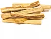 A pile of palo santo wood sticks on a white background. Voir les images du produit