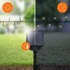 A solar-powered string light set is shown in a split image, demonstrating its function during the day and night, with icons indicating solar charging and battery status. Produktbild-Vorschau