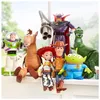 A collection of Toy Story action figures arranged on a windowsill. Voir les images du produit