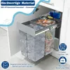 A pull-out kitchen trash can system with two compartments, shown installed under a cabinet. Voir les images du produit