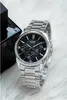 A close-up shot of a silver Casio watch with a black dial, placed on a white, fluffy surface. Produktbild-Vorschau