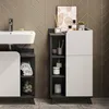 A bathroom vanity with a sink and storage cabinets, decorated with toiletries and towels. Náhled obrázku produktu
