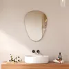 A bathroom vanity with a sink, faucet, and mirror. Náhľad obrázku produktu