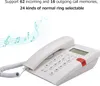 A white corded telephone with a keypad and a small screen, set against a white background with musical notes graphics. Produktbild-Vorschau