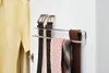A closet interior with a shirt on the left and a belt and tie rack on the right. Produktbild-Vorschau