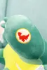 Close-up of a plush toy dinosaur's foot with an embroidered logo. Produktbild-Vorschau