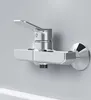 A close-up studio shot of a chrome shower faucet mounted on a light gray wall. Produktbild-Vorschau
