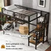 A loft bed with a desk and stairs, set in a room with a textured wall. Anteprima dell’immagine prodotto