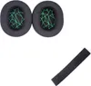 Two black ear pads with a green geometric pattern and a black headband pad are arranged on a white background. Náhled obrázku produktu