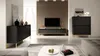 A modern living room with a TV and furniture. Anteprima dell’immagine prodotto