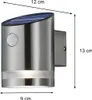 A silver outdoor wall light with a solar panel and motion sensor, shown with dimensions indicated by measurement lines and text. Produktbild-Vorschau