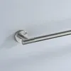 A close-up of a brushed nickel towel bar mounted on a light gray wall. Podgląd zdjęcia produktu