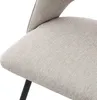 Close-up of the fabric texture of a chair seat and a black metal leg. Produktbild-Vorschau
