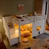 A child's bedroom with a white loft bed, decorated with stuffed animals and soft lighting. Produktbild-Vorschau