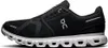 A side view of a black and white running shoe. Anteprima dell’immagine prodotto