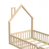 A wooden bed frame with a house-like structure and a slatted base, shown from a diagonal angle against a white background. Náhľad obrázku produktu