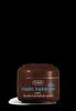 A brown jar of Ziaja cocoa butter cream is shown against a black background. Podgląd zdjęcia produktu
