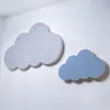 Two cloud-shaped acoustic panels mounted on a white wall. Produktbild-Vorschau