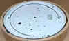 The underside of a round wooden ceiling lamp is shown, with wiring and mounting hardware visible. Produktbild-Vorschau