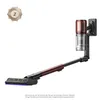 A cordless vacuum cleaner mounted on a wall dock, with its components extended. Produktbild-Vorschau