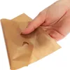 A hand holding a reusable toast bag with a hole in it. Produktbild-Vorschau