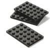 Two stacks of black LEGO baseplates on a white background. Podgląd zdjęcia produktu