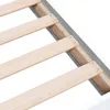 A close-up view of the wooden slats of a bed frame. Náhled obrázku produktu