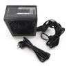 A black computer power supply unit with its cables and power cord on a white background. Produktbild-Vorschau