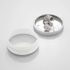A disassembled ceiling lamp with its base and glass shade shown separately on a white background. Produktbild-Vorschau
