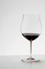 A clear glass wine glass filled with red wine, set against a plain white background. Podgląd zdjęcia produktu