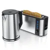 A silver electric kettle and a silver toaster with bread in it, displayed on a white background. Podgląd zdjęcia produktu
