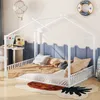 A child's bedroom with a white house-shaped bed, decorated with a hot air balloon and a life preserver.