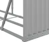 Close-up of the corner of a grey metal firewood rack, showing the corrugated side panel and the metal frame. Náhled obrázku produktu