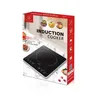 The image shows the packaging of an induction cooker, with the product itself partially visible. Produktbild-Vorschau