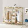 A wooden garment rack with clothes and accessories displayed on shelves and hanging rods, set against a light gray wall. Anteprima dell’immagine prodotto