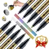 A collection of metallic marker pens and decorated stones, with a hand demonstrating their use. Produktbild-Vorschau