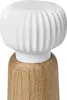 A close-up studio shot of a white and wood mill. Podgląd zdjęcia produktu
