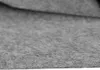 A close-up, low-angle shot of a gray fabric material. Anteprima dell’immagine prodotto