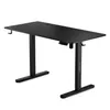 A black adjustable height desk shown from a three-quarter angle against a white background. Anteprima dell’immagine prodotto