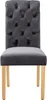 A single gray upholstered dining chair with wooden legs, shown from the front. Voir les images du produit