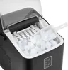 A close-up view of an open ice maker filled with ice cubes and a scoop. Podgląd zdjęcia produktu