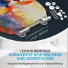 A close-up of a toilet seat with a colorful abstract design, showing mounting hardware and text overlays. Produktbild-Vorschau