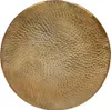 A hammered brass side table viewed from a top-down angle. Náhled obrázku produktu