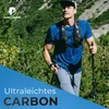 A man hiking on a mountain trail with trekking poles. Produktbild-Vorschau