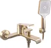 A gold-colored bathtub faucet and showerhead are shown against a white background. Produktbild-Vorschau