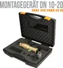 A black carrying case with foam inserts holds a brass valve assembly and various accessories. The case is open, and the product is displayed inside. Anteprima dell’immagine prodotto
