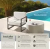 A modern outdoor lounge chair and coffee table set next to a swimming pool. Náhled obrázku produktu