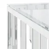 A close-up view of the corner of a glass-top table with a white frame and mirrored panels. Produktbild-Vorschau