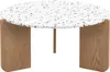 A round coffee table with a speckled top and wooden legs. Voir les images du produit